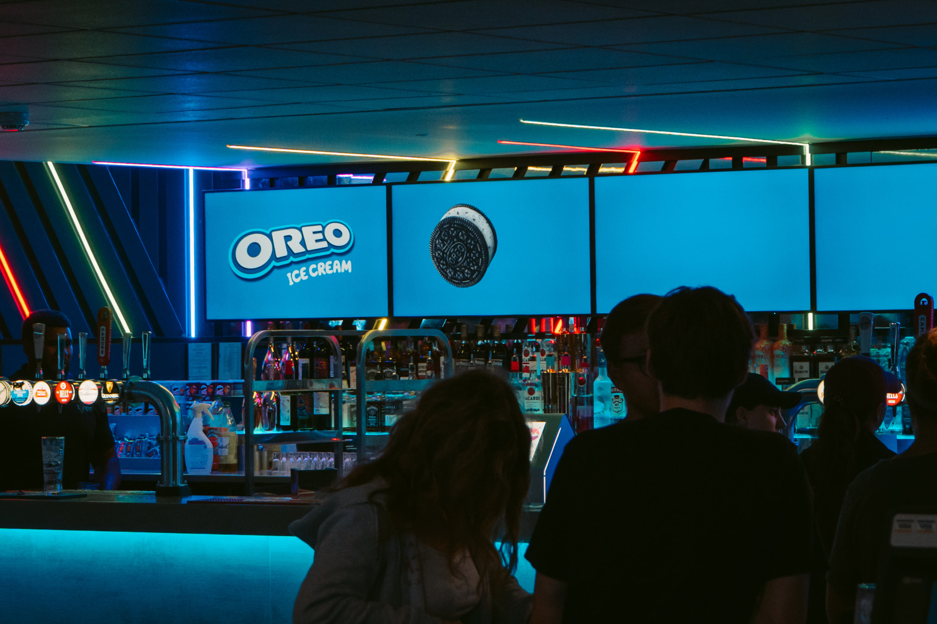 Oreo campaign on the bar back screens