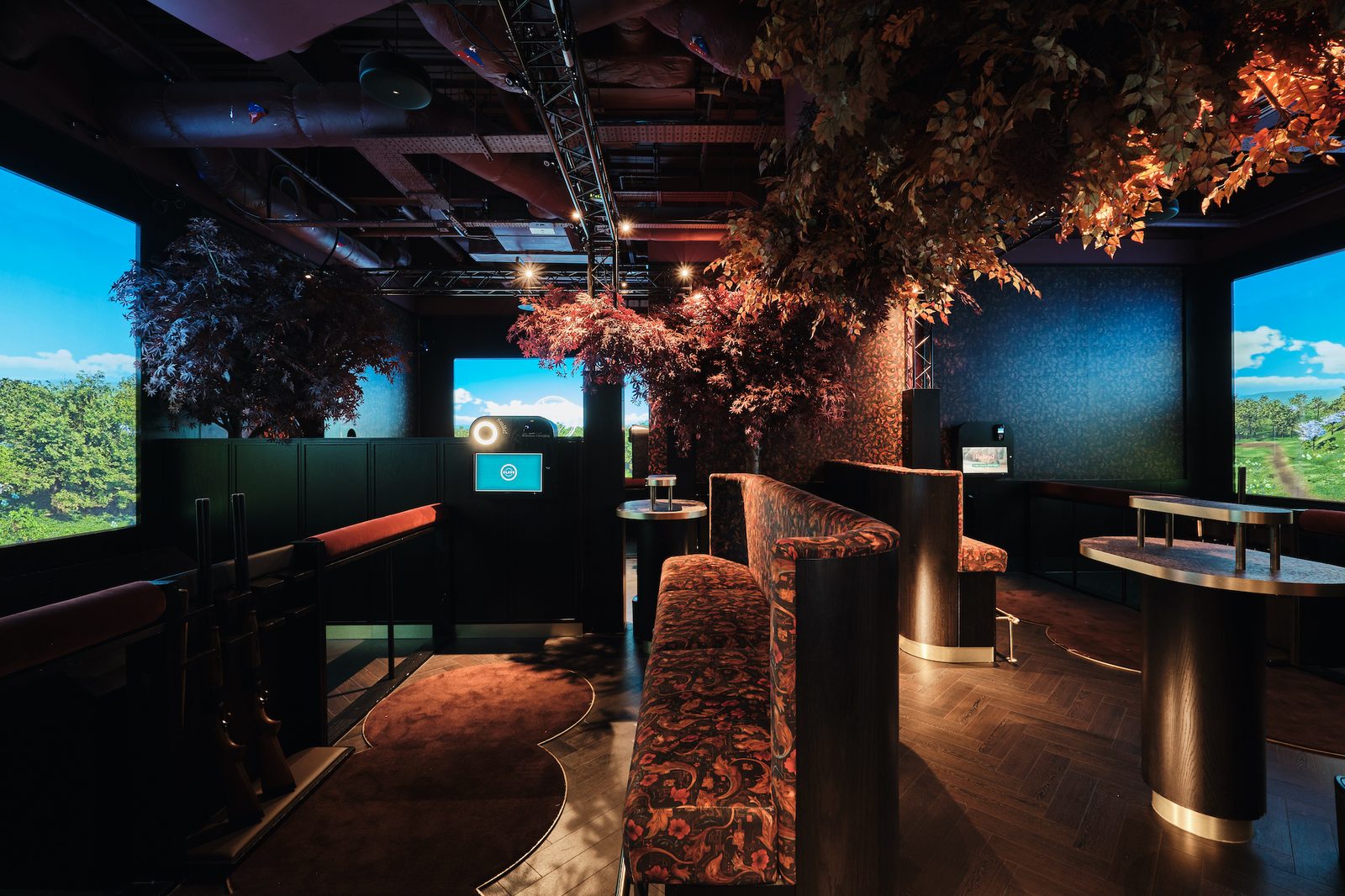 Clays shooting simulator lounge surrounded by dramatic planting
